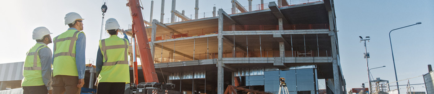 engineers inspect construction site
