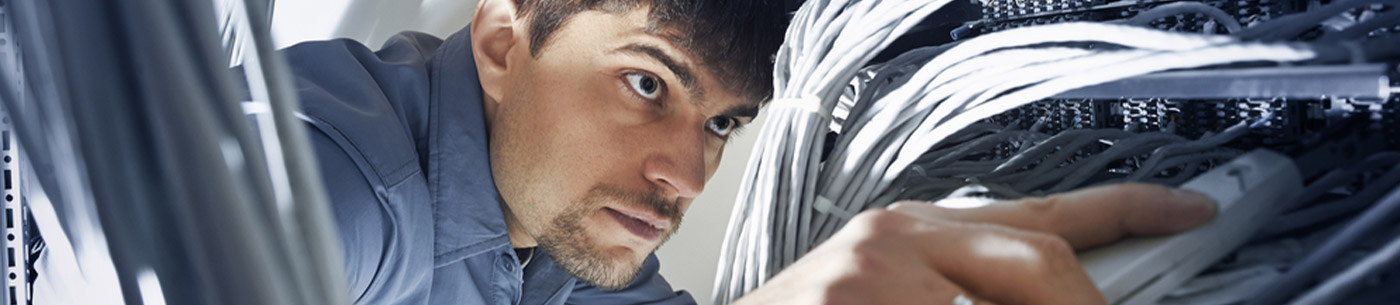 IT technician assessing cables